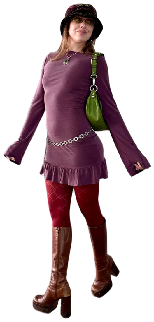 Allison in a purple dress, velvet bucket hat, red tights, and platform boots, with a green shoulder bag